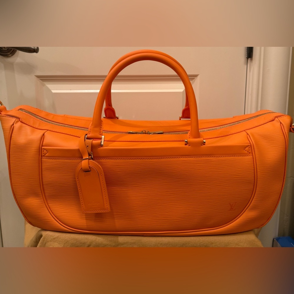 Very rare limited edition, Louis Vuitton orange epi leather yoga set